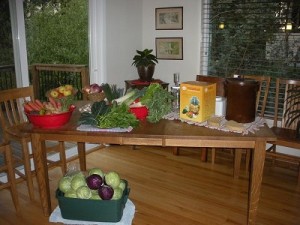 table full of organic produce for making sauerkraut